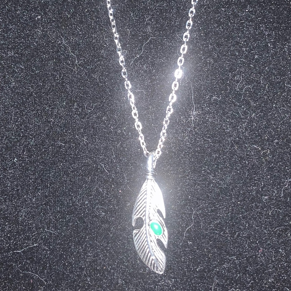 Silver chain with a feather